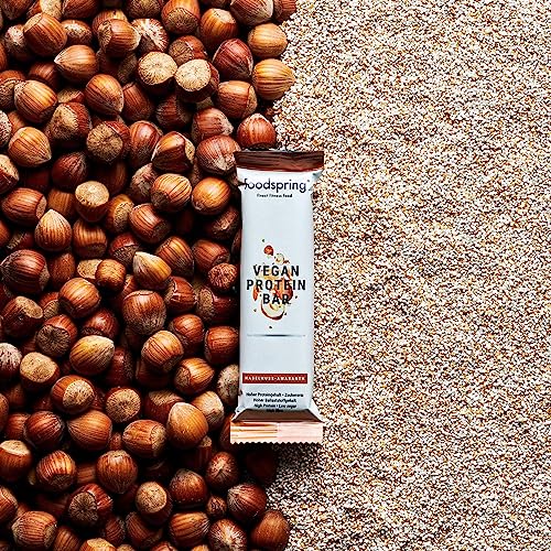 foodspring Barrita Proteica Vegana, 12 x 60g, Avellanas y Amaranto, tu snack proteico vegano con proteína 100% vegetal