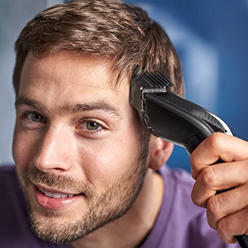 Philips Cortapelos con cuchillas de titanio, 3 Peines guía, 28 Ajustes de longitud, 90 min de uso sin cable, Incluye funda de viaje, Color Negro